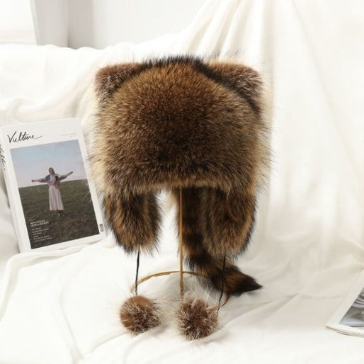 Women Cozy faux fur hat with side pom poms Lune London