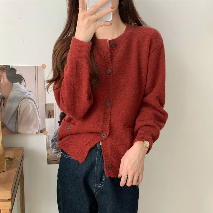 Cardigan tricoté confortable pour femmes avec poches pratiques et fermeture à boutons Chic & Stil