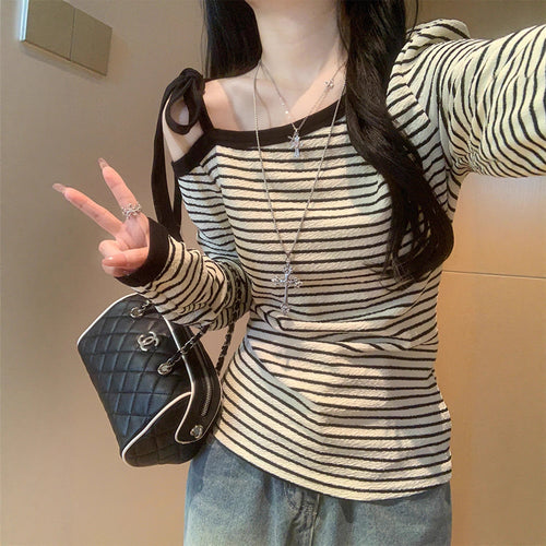 Ladies long sleeve top with off-shoulder design and fashionable stripes Chic & Stil