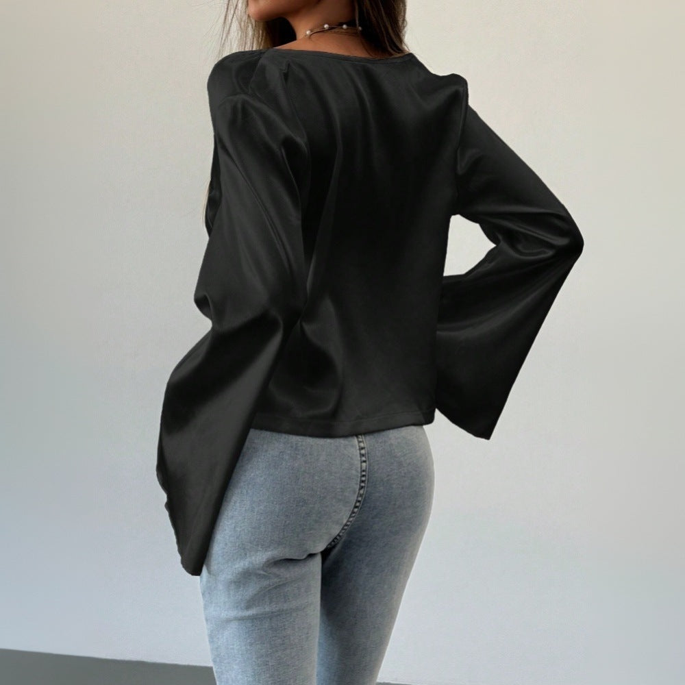 Blouse élégante femme avec décolleté en V profond et détail de nœud décontracté Chic & Stil