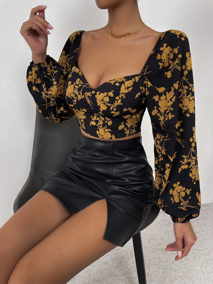 Haut court pour femmes avec motif floral et élégante manche bouffante Chic & Stil
