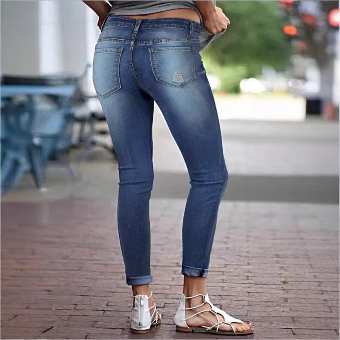 Women's Cropped Slim-Fit Denim Pants with mid-rise waist, cuffed hem and subtle used look Amarae
