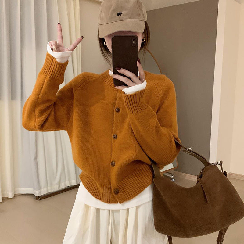 Comfortable knit sweater for women with button details and dropped shoulders Lune London