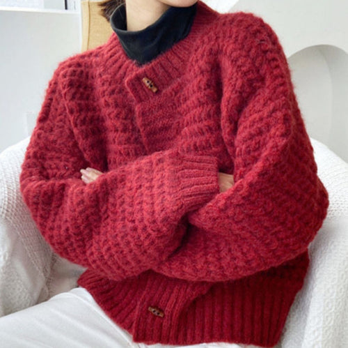 Chunky knit sweater for women with decorative button placket and honeycomb pattern Amarae