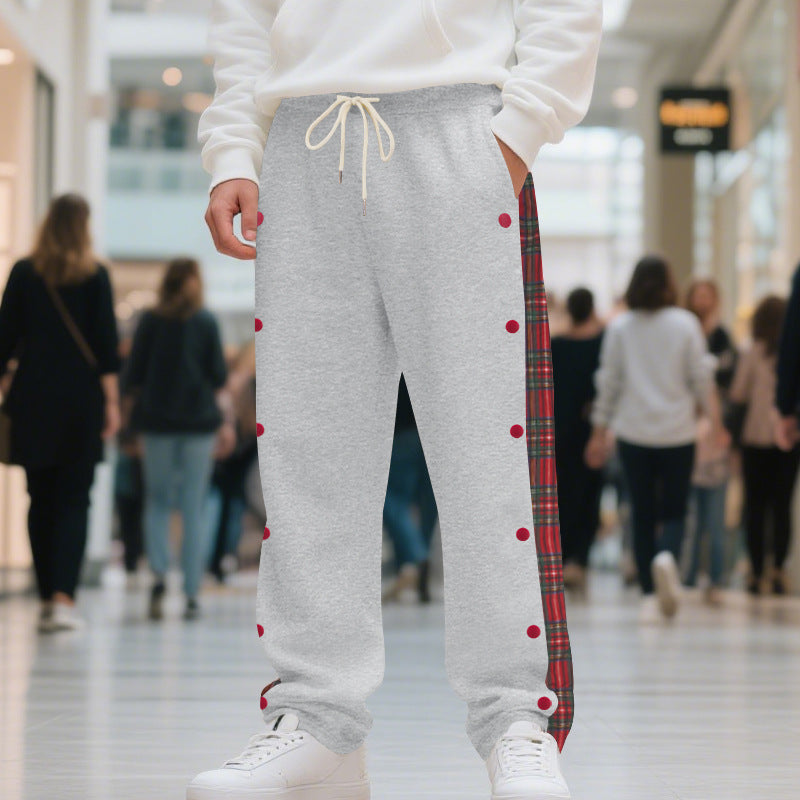 Sporty jogger pants for men with side snap buttons and chic plaid design