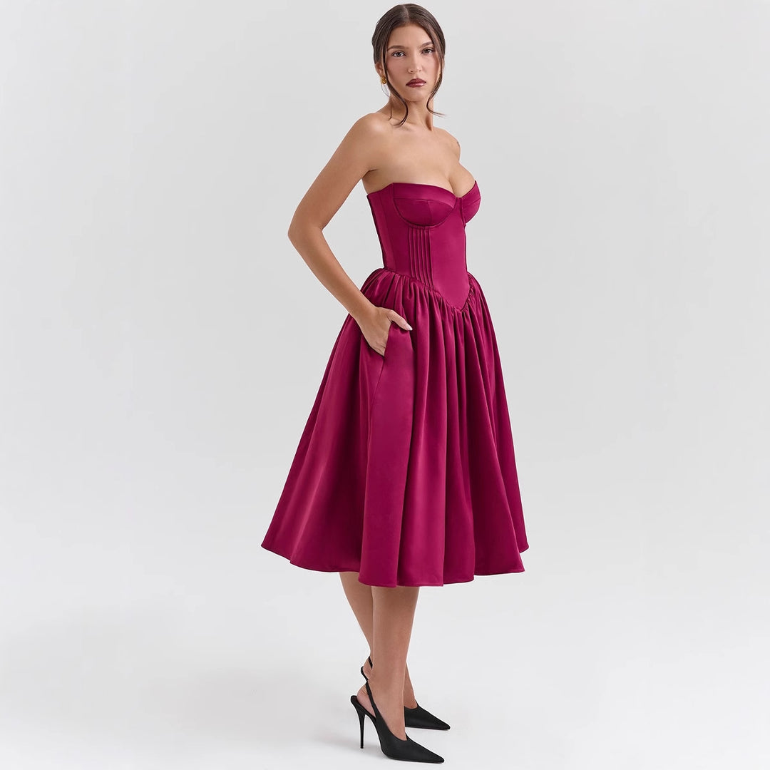 Ladies' couture dress in an off-the-shoulder strap design with a voluminous skirt Lune London