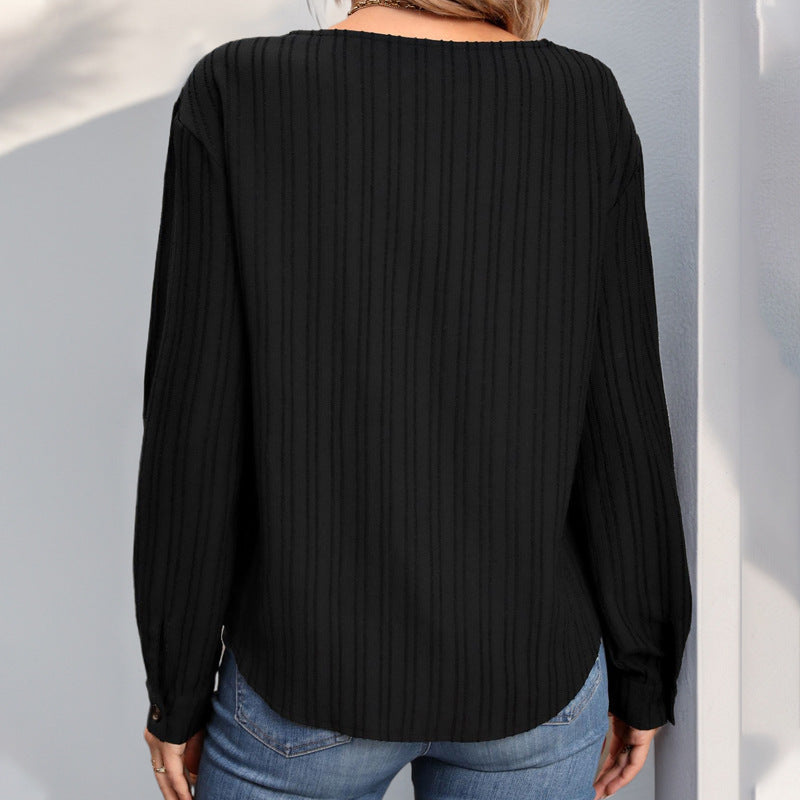 Women’s knit top with a unique V-neckline and a button placket Lune London