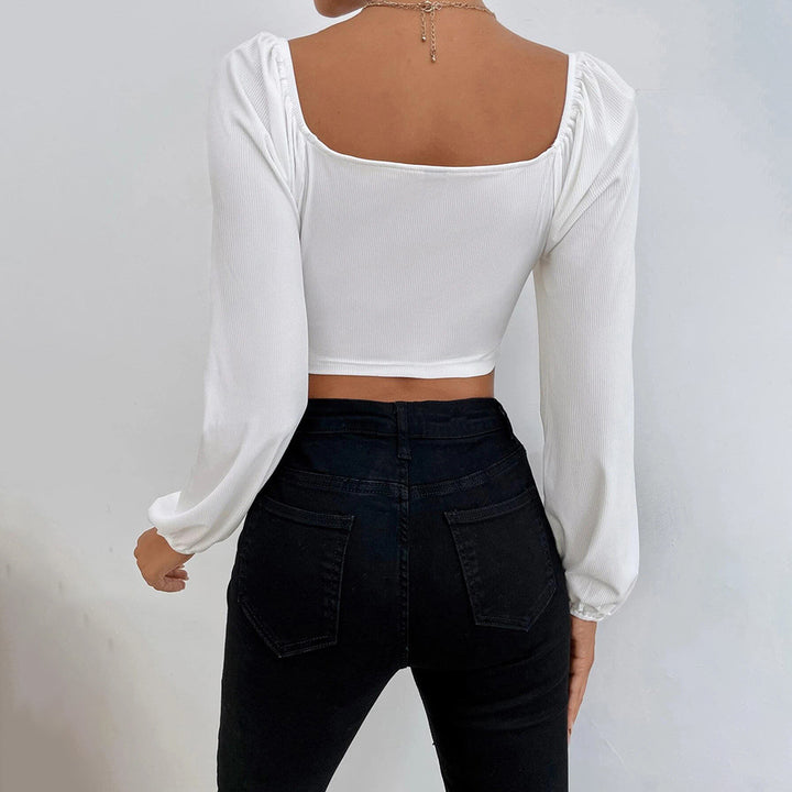 Haut court pour femmes avec un design de manches bouffantes élégant et une coupe ajustée Chic & Stil