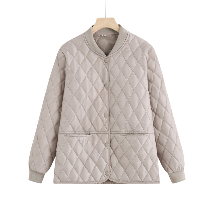 Women's quilted transition jacket with practical pockets and elastic cuffs Lune London