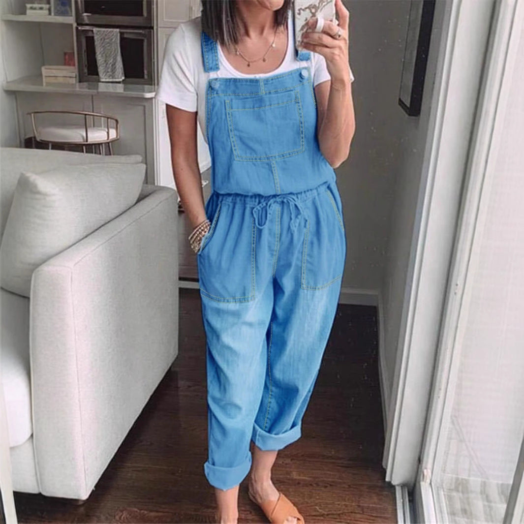 Women's overall jumpsuit made of lightweight denim with a drawstring waistband, patch pockets, and turned-up hem Amarae