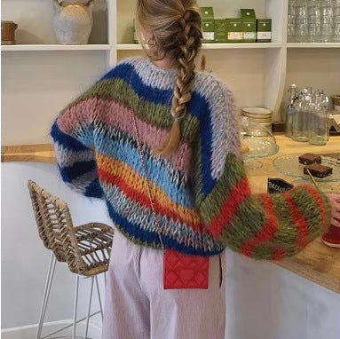 Comfortable knit sweater for women with flared sleeves and a colorful striped pattern Lune London