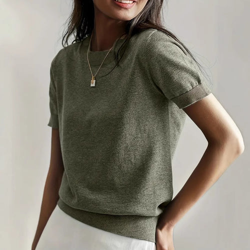 Fine knit sweater for women with a short sleeve silhouette and a soft fluid material Elegance and style