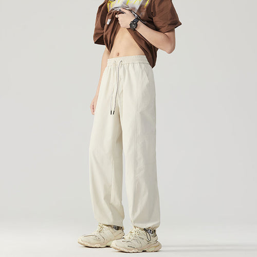 Pantalon de sport respirant pour hommes avec taille ajustable et poches zippées latérales Amarae