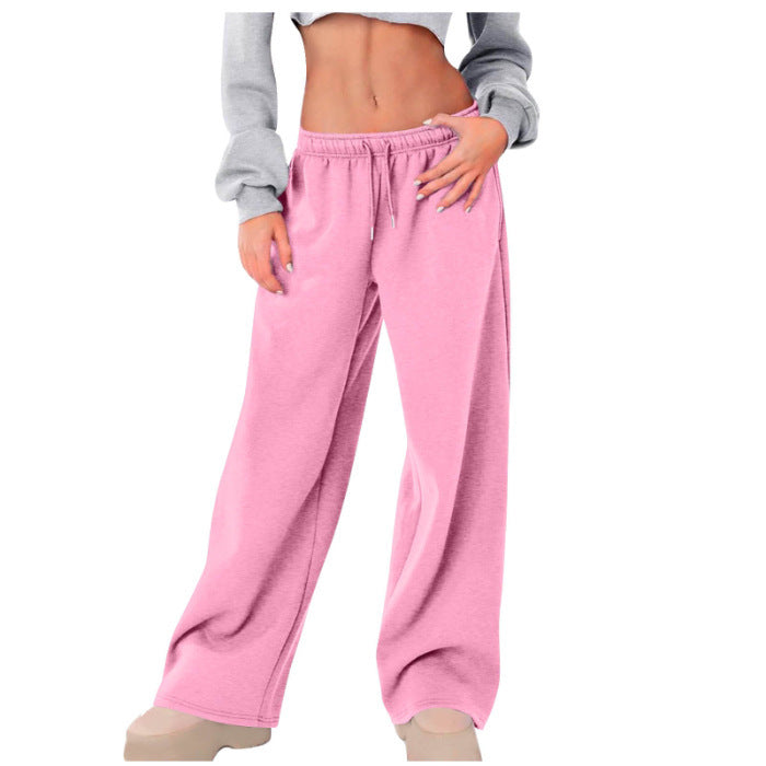 Women's loose casual pants with elastic waistband and side pockets Chic & Stil