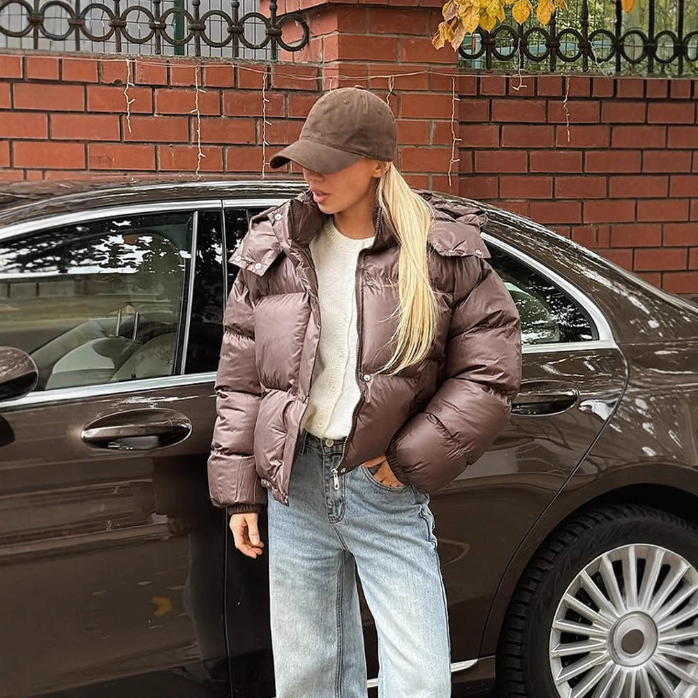 Women's short-cut shiny quilted jacket with high stand-up collar and snap-button placket Amarae