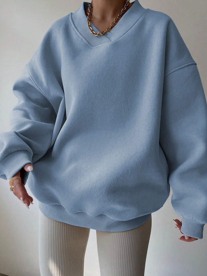 Women Oversized Sweatshirt with V-Neck and Wide Hem Lune London