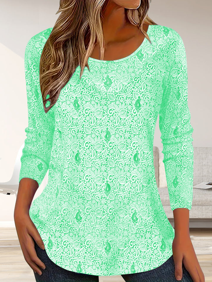 Simple long sleeve women's blouse with floral design and round neckline Lune London