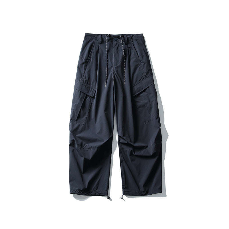 Men's loose technical cargo pants with drawstring waistband and adjustable leg closures Amarae