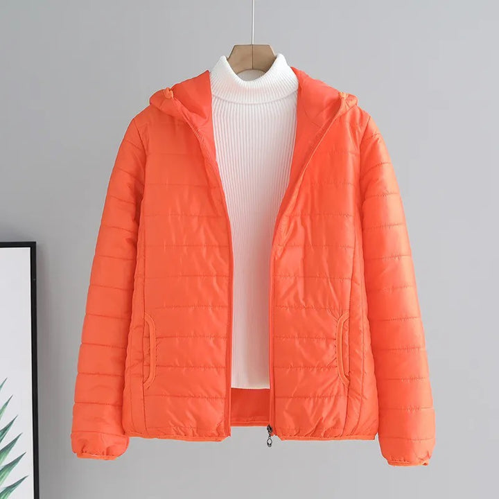 Ladies quilted transitional jacket with practical pockets and hood Amarae