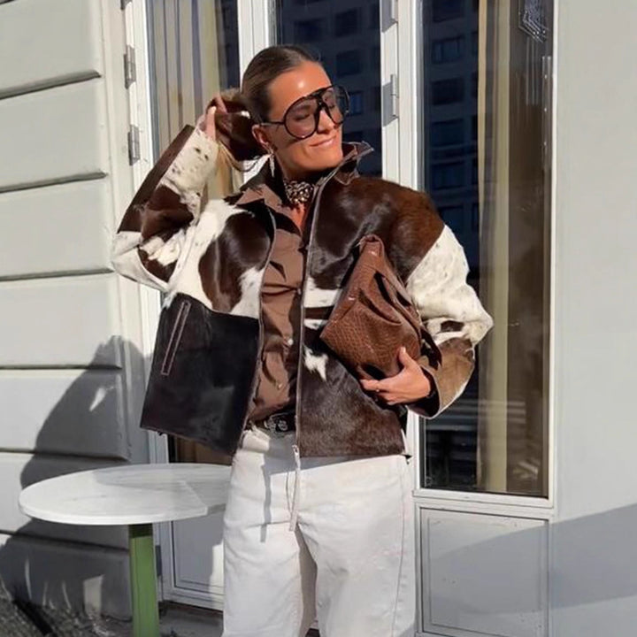Women's short jacket made of shaggy faux fur with patchwork look and high stand-up collar Amarae