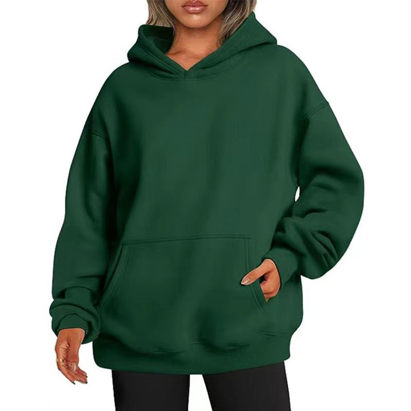 Women's oversized hoodie with practical kangaroo pockets and soft inner lining Chic & Stil