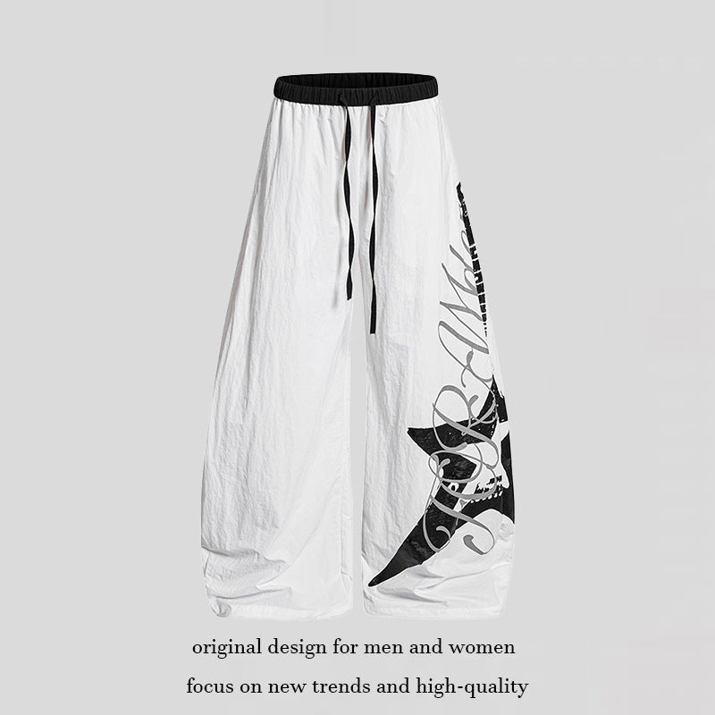 Women's Wide Palazzo Trousers with Drawstring Waist and Large Statement Print Amarae