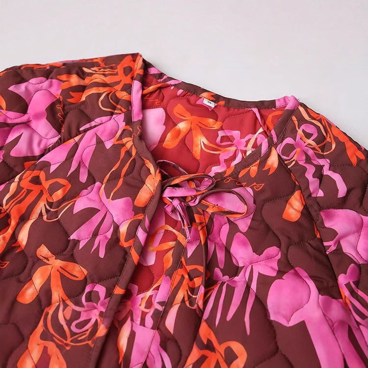 Veste matelassée légère pour femmes avec motif de nœud coloré Chic & Stil