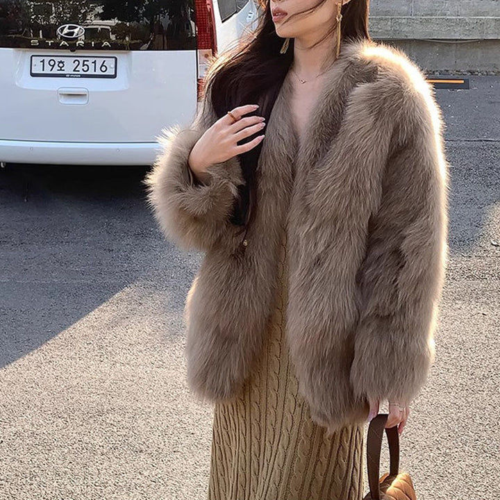 Veste en fausse fourrure à la mode pour femmes avec des détails de bouton élégants Chic & Stil