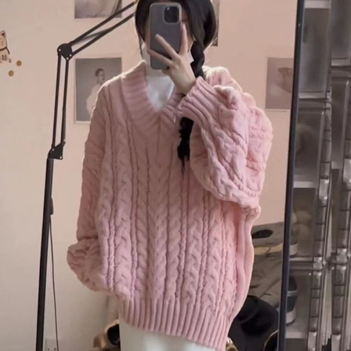 Pull en tricot épais pour femmes avec col en V et manches volumineuses Chic & Stil