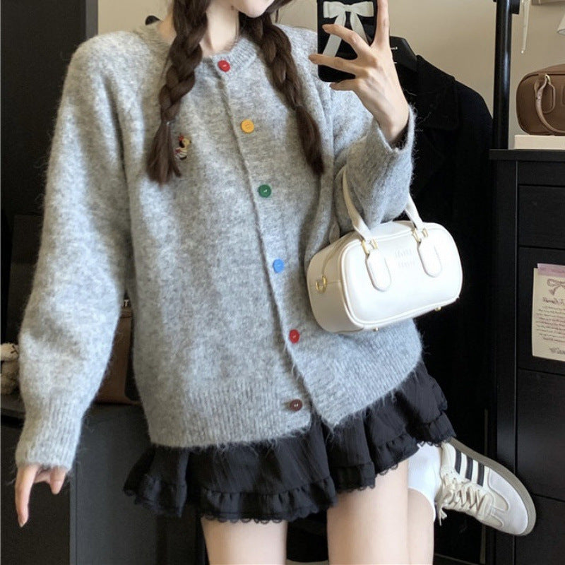Knitted jacket for women with colored buttons and an embroidered pattern Lune London