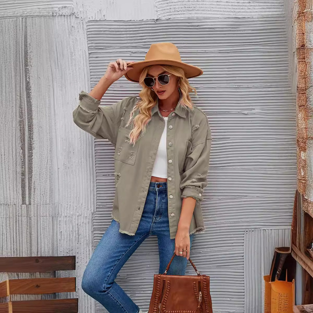 Oversized denim jacket for women with distressing effects