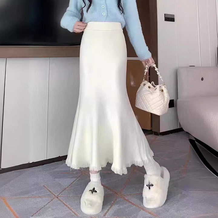 Elegant maxi skirt for women with voluminous hem and fringed details Lune London