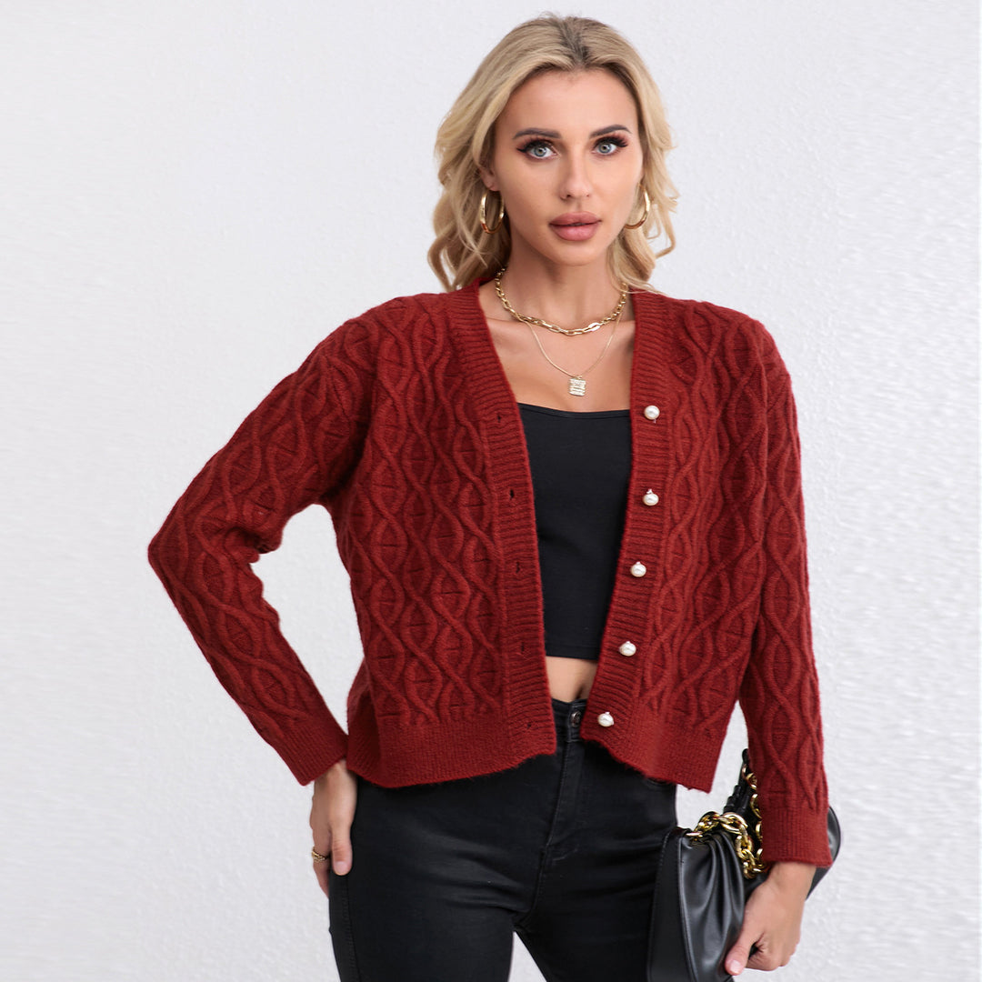 Women's knit jacket with modern cable pattern and pastel button details Lune London