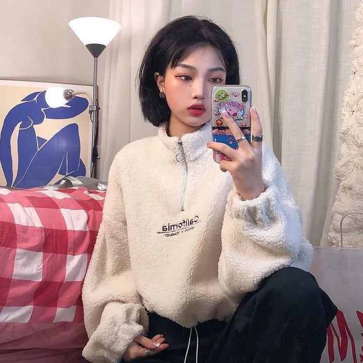 Women’s fleece pullover with stand-up collar and zipper Chic & Stil