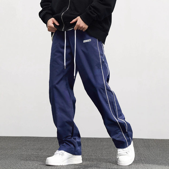 Casual men's jogger pants with elastic waist and contrasting side stripes Lune London