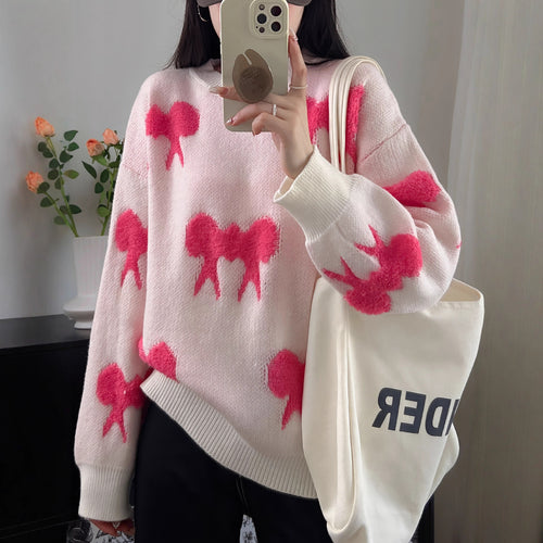 Cozy knitted sweater for women with playful bow pattern Amarae