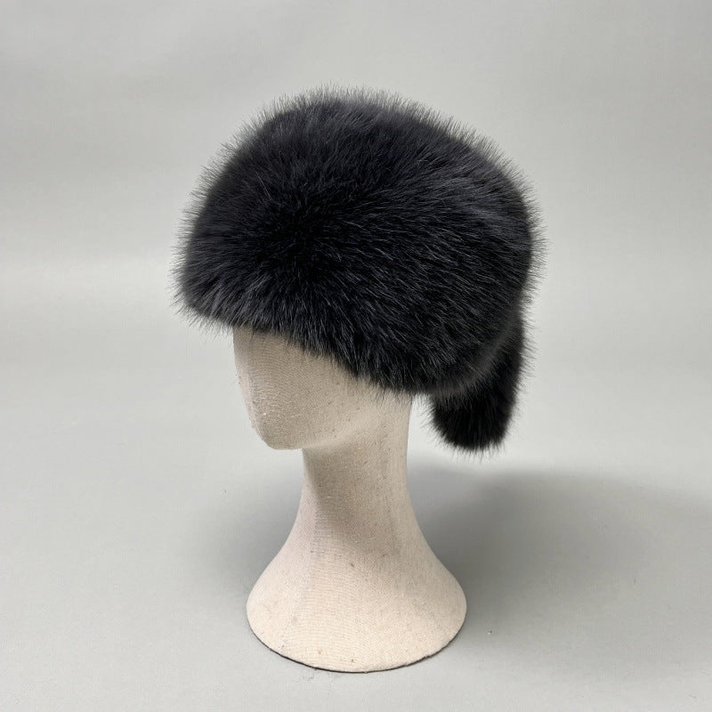 Women’s plush faux fur trapper hat with earflaps and decorative tail Amarae