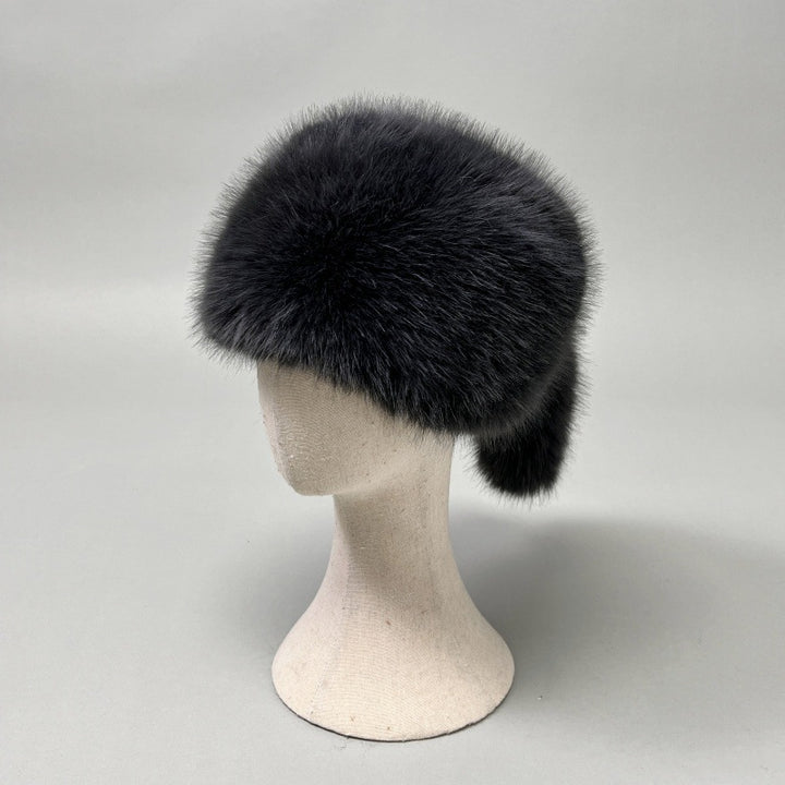 Women’s plush faux fur trapper hat with earflaps and decorative tail Amarae