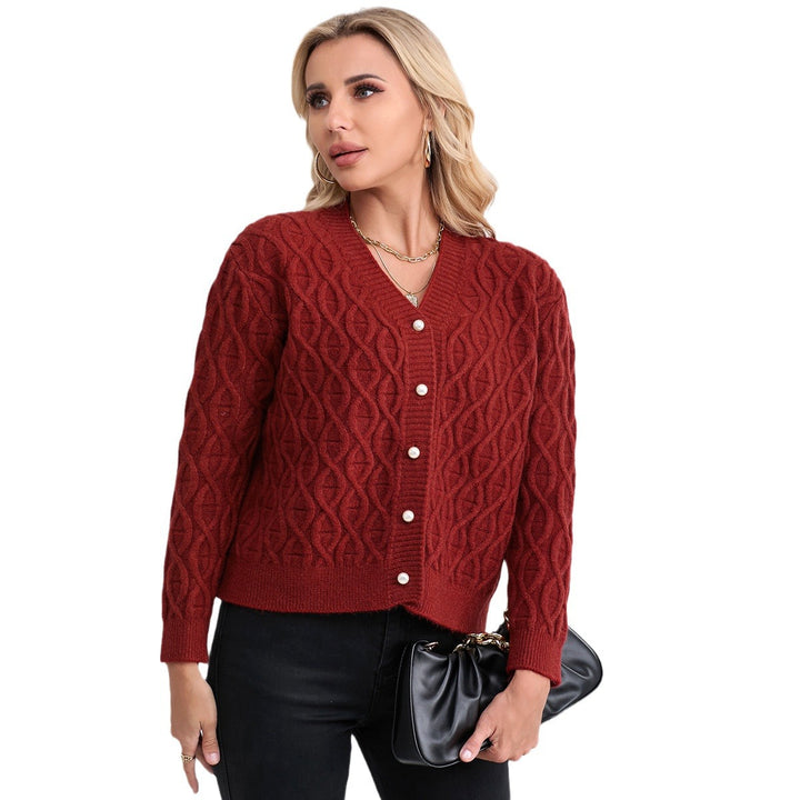 Women's knit jacket with modern cable pattern and pastel button details Lune London