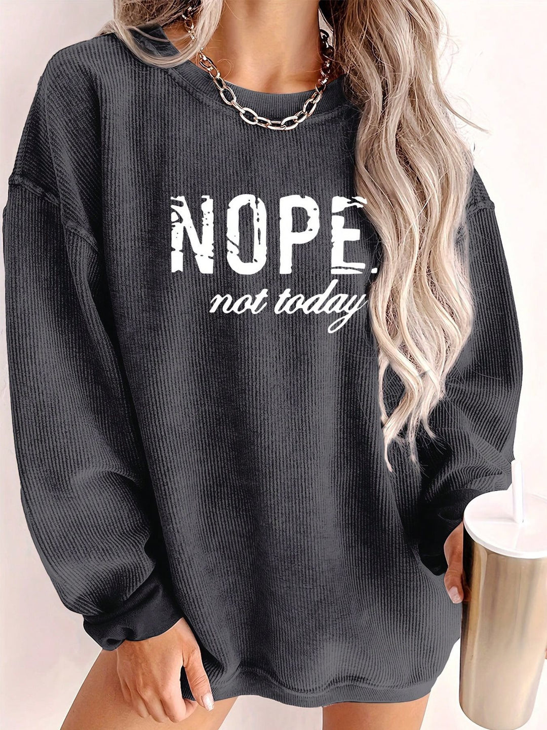 Casual oversized sweater for women with statement print and ribbed texture Lune London
