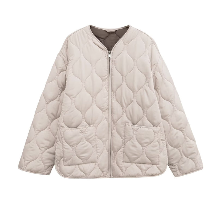 Veste de transition matelassée pour femmes avec poches latérales et coupe moderne Chic & Stil