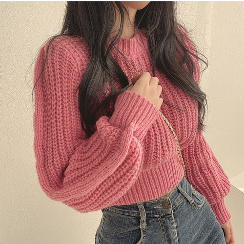 Thick knit women's sweater with oversized sleeves and a textured structure Amarae