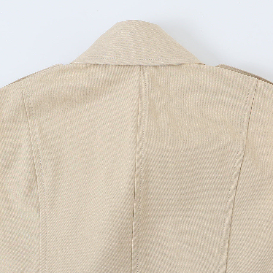 Women's sleeveless tailored trench vest with cut-out, shoulder flaps, and flap pockets Amarae