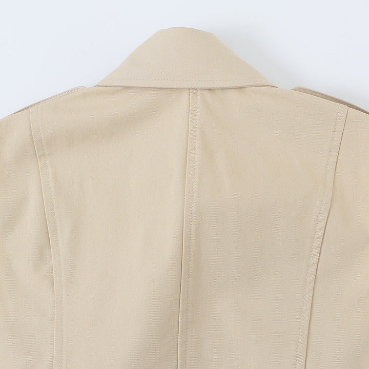 Women's sleeveless tailored trench vest with cut-out, shoulder flaps, and flap pockets Amarae