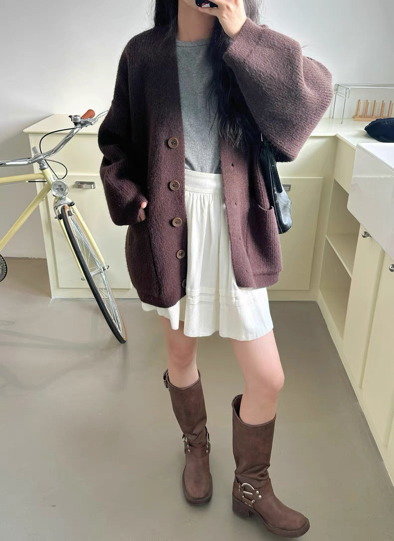 Cardigan en tricot épais pour femmes avec des détails de boutons élégants et des poches pratiques Chic & Stil
