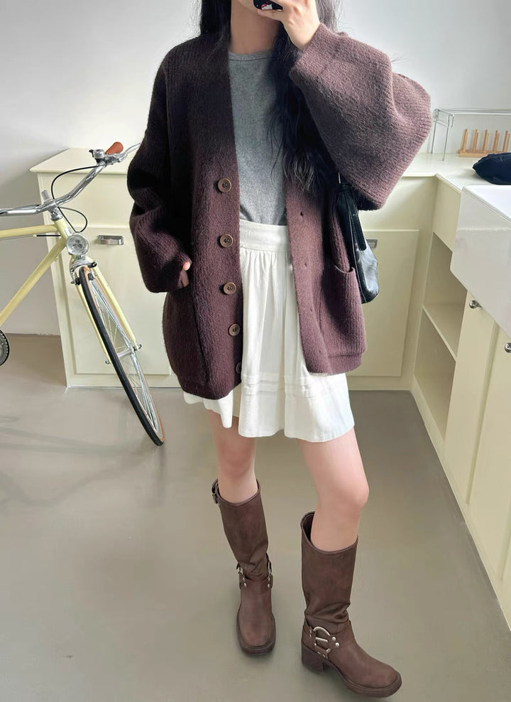Cardigan en tricot épais pour femmes avec des détails de boutons élégants et des poches pratiques Chic & Stil