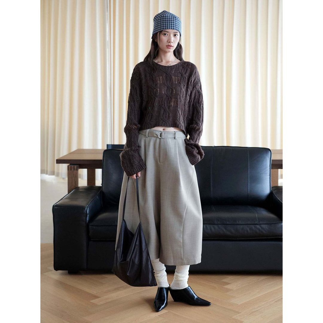 Women’s short oversized knitted sweater with openwork pattern and fringes