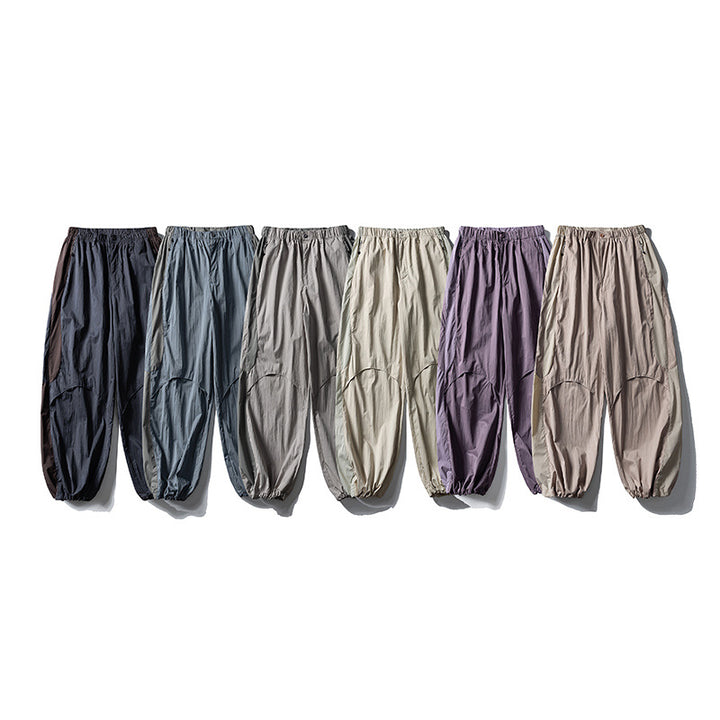 Men's loose technical nylon cargo pants with elastic waistband and panel details Amarae