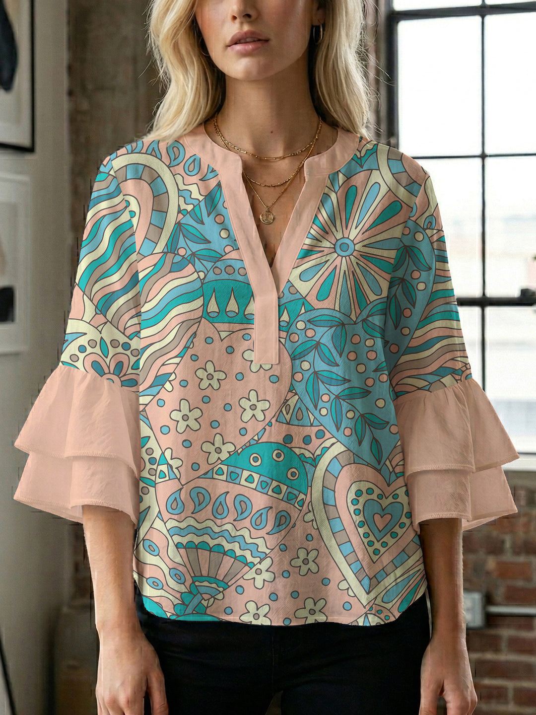 Ladies elegant top with voluminous ruffle hems and floral design Lune London