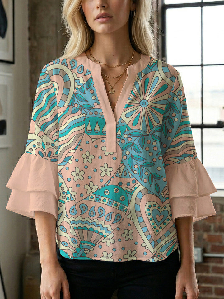 Ladies elegant top with voluminous ruffle hems and floral design Lune London